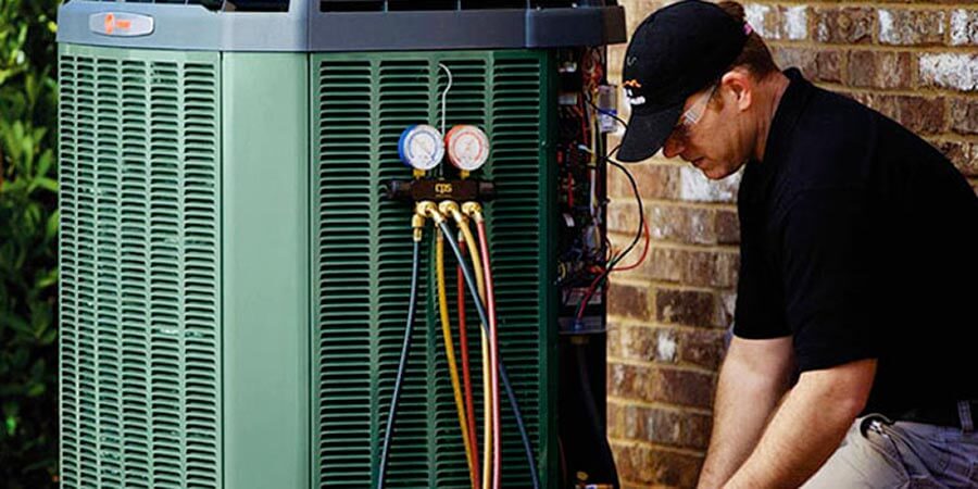 Technician checking unit
